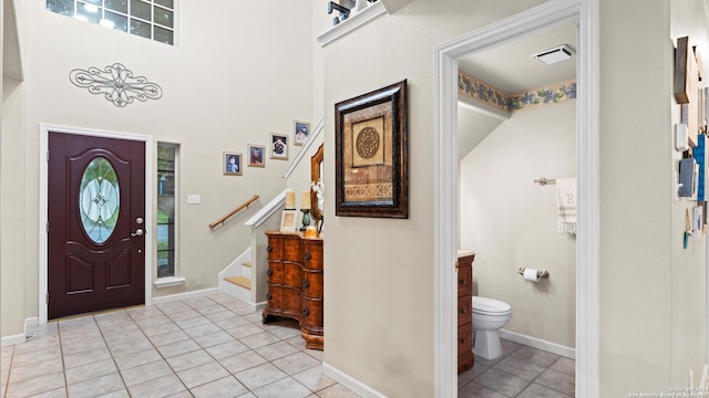 foyer entrance featuring light tile patterned floors