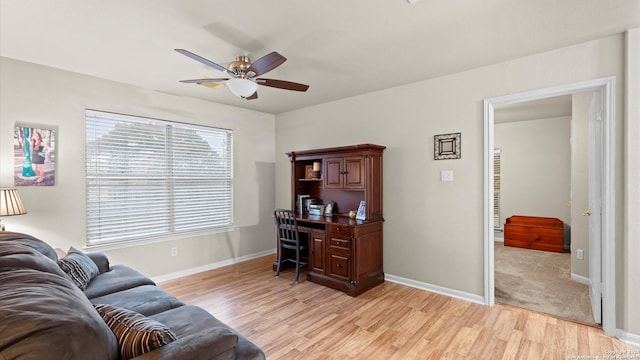 office area with ceiling fan and light wood-type flooring