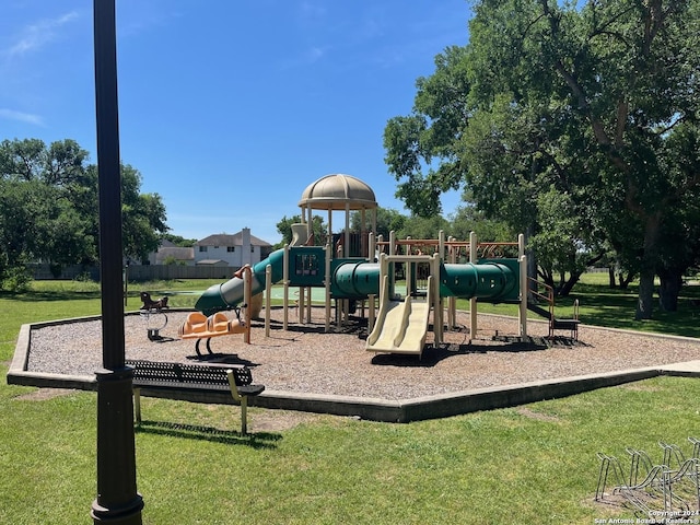 view of play area featuring a lawn