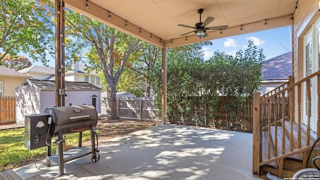 view of patio with ceiling fan and a grill