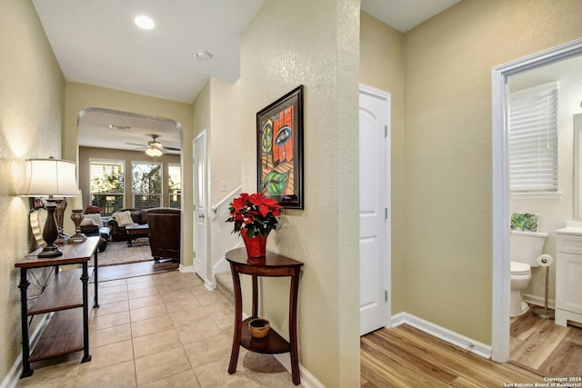 corridor featuring light hardwood / wood-style flooring