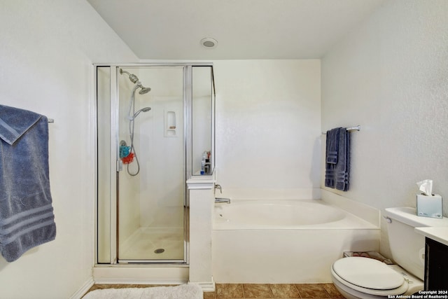 bathroom with tile patterned floors, separate shower and tub, and toilet