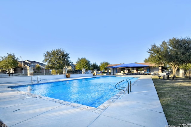 view of swimming pool featuring a patio