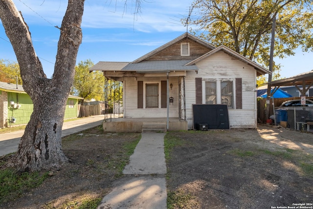 bungalow-style house featuring a porch