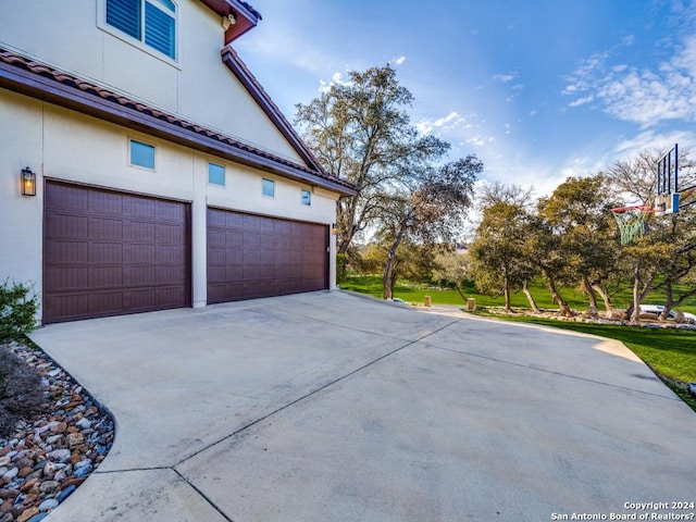 garage with driveway