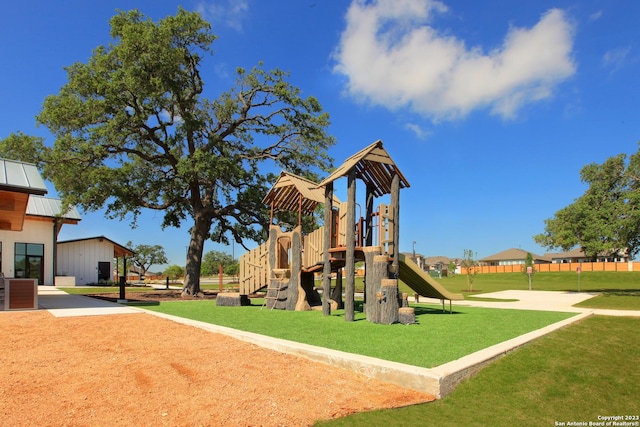 view of jungle gym featuring a yard