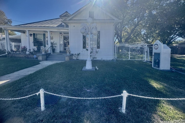 exterior space with a lawn and a porch