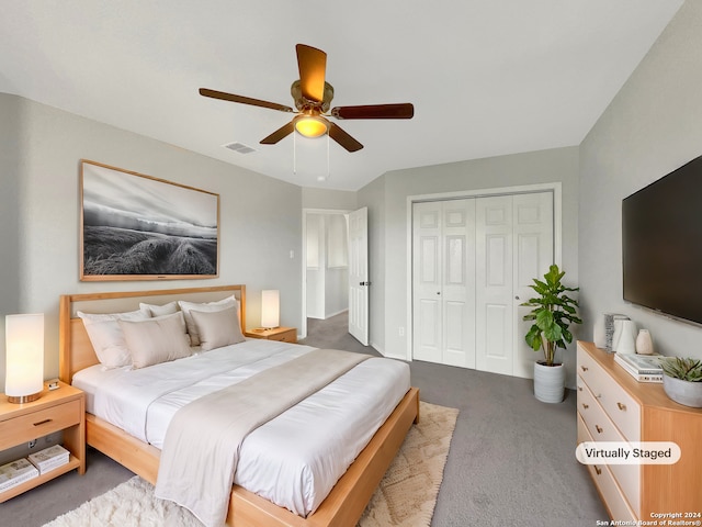 bedroom with carpet flooring, ceiling fan, and a closet