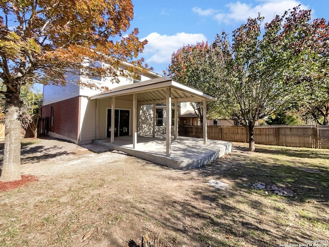 rear view of property with a patio