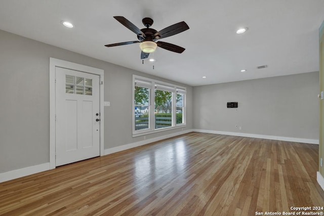 interior space featuring ceiling fan and light wood-type flooring