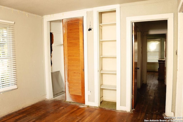 hall featuring dark hardwood / wood-style flooring