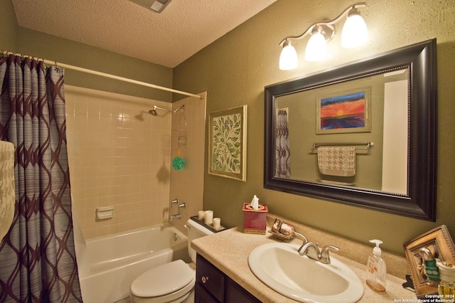 full bathroom featuring vanity, shower / tub combo, a textured ceiling, and toilet