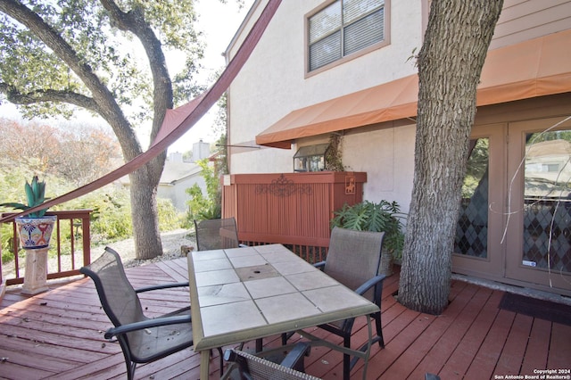 wooden terrace with french doors