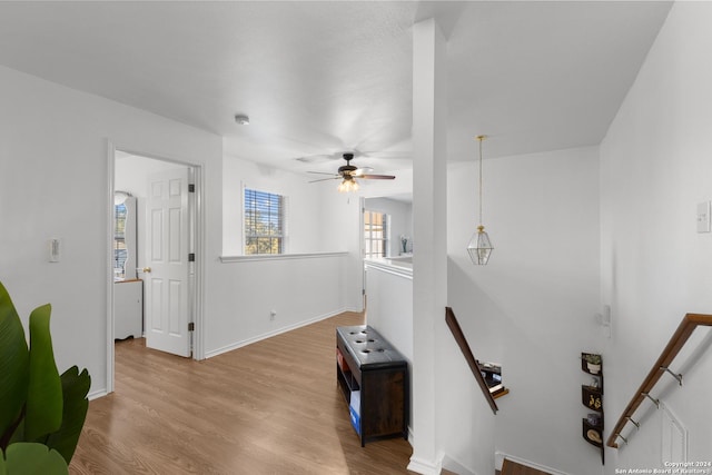 interior space featuring ceiling fan and wood-type flooring