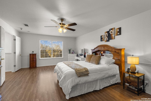 bedroom featuring wood-type flooring and ceiling fan