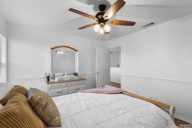 bedroom featuring hardwood / wood-style floors and ceiling fan