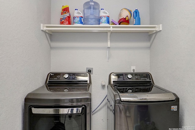 washroom with independent washer and dryer