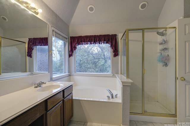 bathroom with tile patterned floors, a textured ceiling, and vaulted ceiling