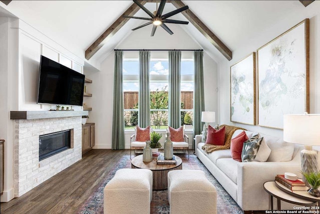 living room featuring a fireplace, lofted ceiling with beams, ceiling fan, and dark wood-type flooring