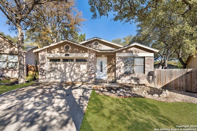 single story home with a garage