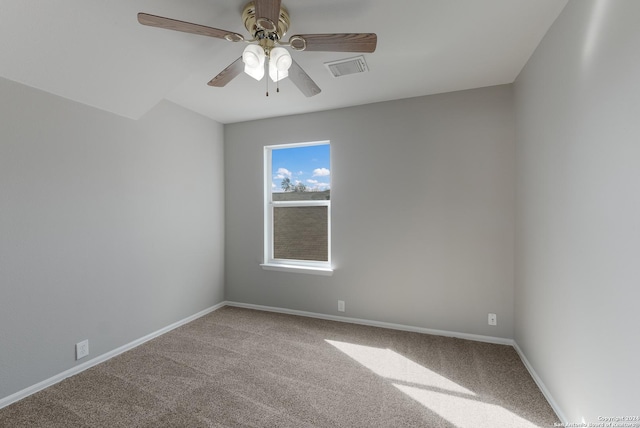 spare room with carpet flooring and ceiling fan