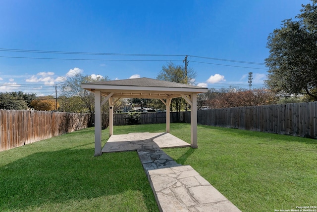 view of yard with a gazebo and a patio area