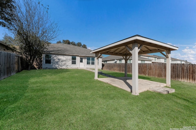 view of yard with a gazebo and a patio