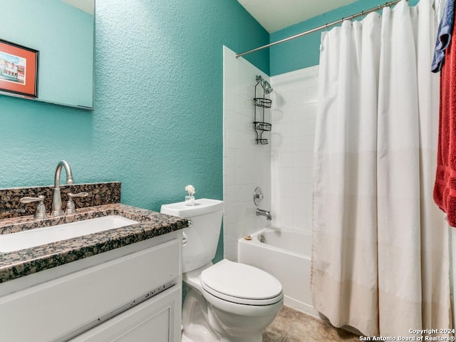 full bathroom with shower / bath combo with shower curtain, vanity, and toilet