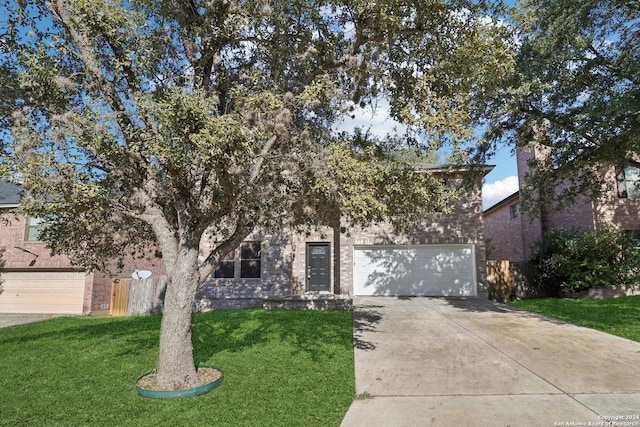 obstructed view of property featuring a front lawn