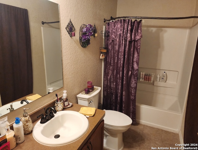 full bathroom with tile patterned flooring, shower / bath combination with curtain, toilet, and vanity