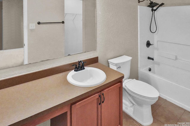 full bathroom with bathing tub / shower combination, tile patterned floors, vanity, and toilet