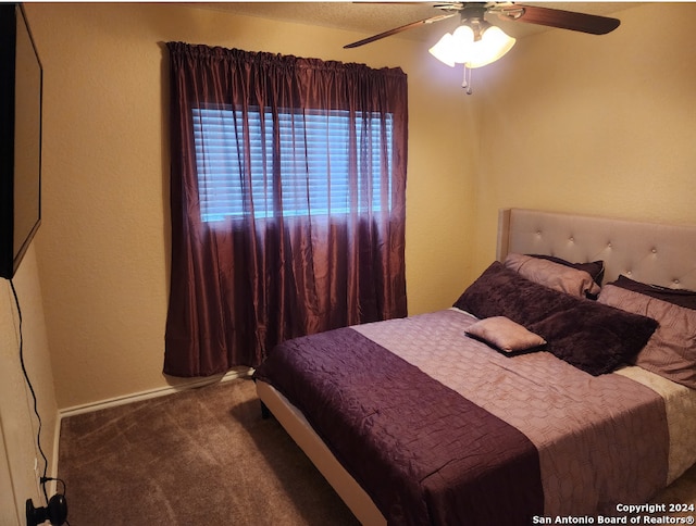 bedroom featuring carpet floors and ceiling fan