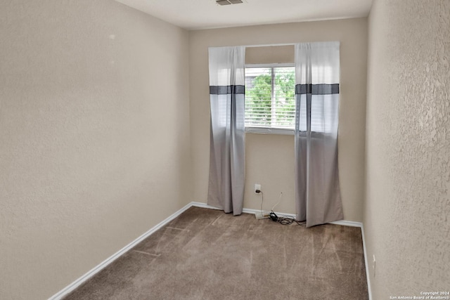 view of carpeted empty room