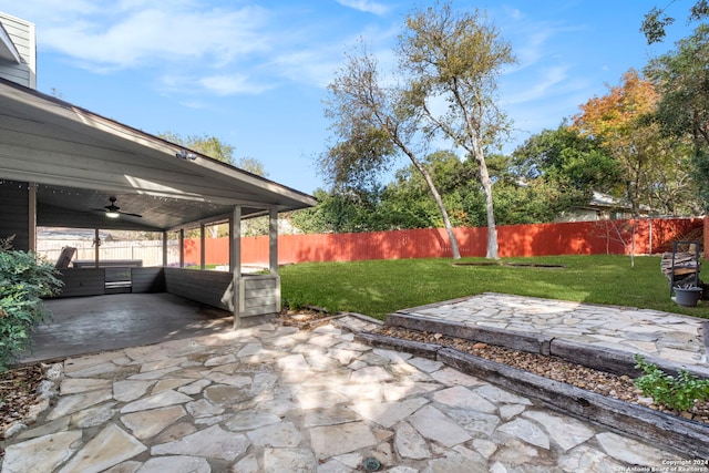 view of patio / terrace featuring ceiling fan