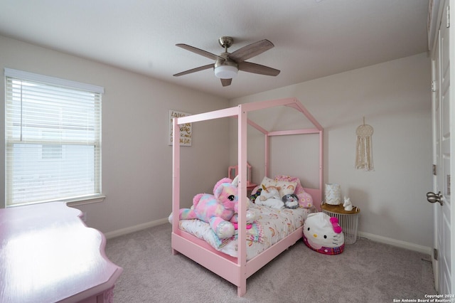 carpeted bedroom featuring ceiling fan