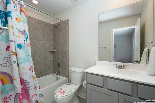 full bathroom featuring vanity, toilet, and shower / bath combo with shower curtain