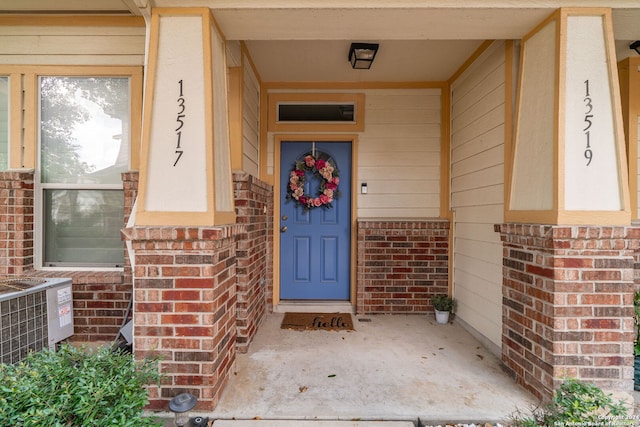 property entrance featuring central air condition unit