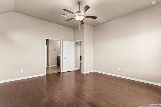 unfurnished bedroom with vaulted ceiling, ceiling fan, and dark wood-type flooring