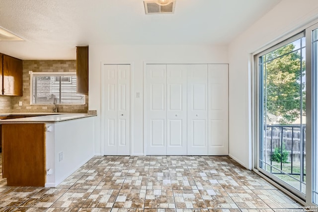 kitchen with sink and backsplash