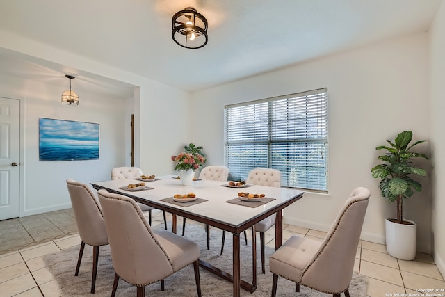 dining room with light tile patterned floors