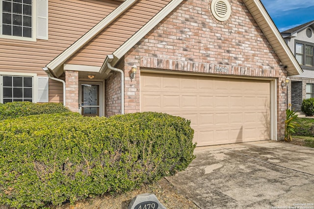 exterior space featuring a garage