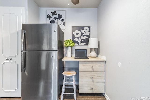 8038 Broadway Unit 225L, San Antonio, TX 78209 - kitchen with freestanding refrigerator, a ceiling fan, light countertops, and wood finished floors