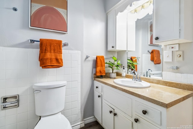 8038 Broadway Unit 225L, San Antonio, TX 78209 - bathroom with vanity and tile walls