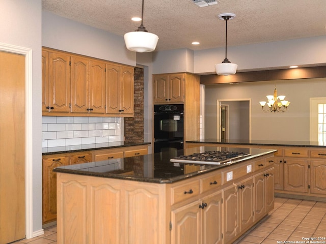 kitchen featuring decorative backsplash, black double oven, stainless steel gas cooktop, light tile patterned floors, and decorative light fixtures