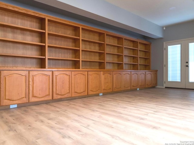 interior space featuring light hardwood / wood-style flooring and french doors