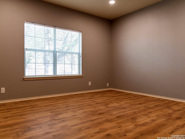 empty room featuring hardwood / wood-style floors