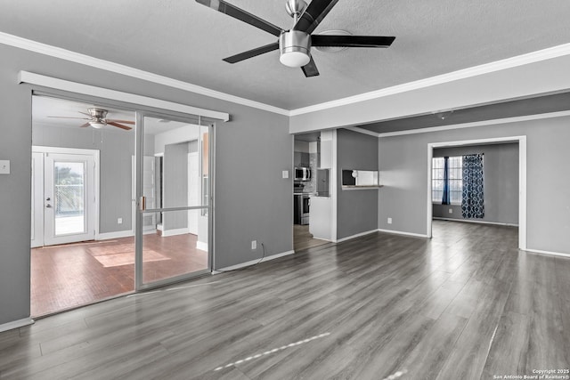 unfurnished living room featuring wood-type flooring, a textured ceiling, ceiling fan, and ornamental molding