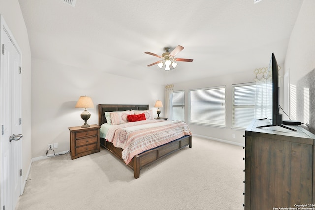 bedroom featuring ceiling fan and light colored carpet