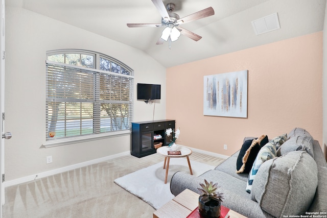 living room with carpet, ceiling fan, and vaulted ceiling