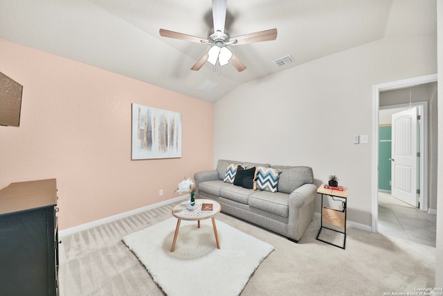 living room with light carpet, ceiling fan, and vaulted ceiling